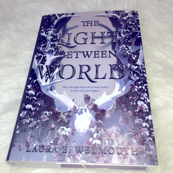 The Light Between Worlds by Laura Weymouth book